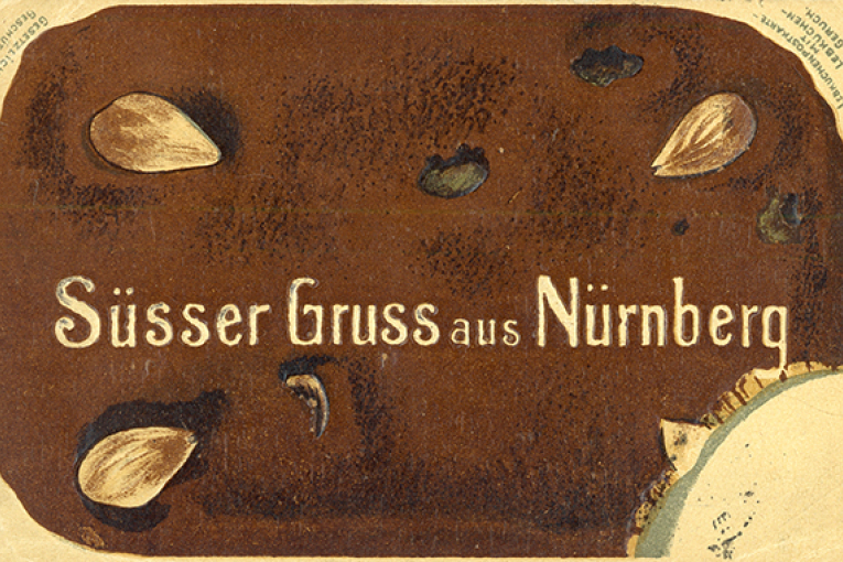 Duftkarte als einziger großer Lebkuchen gestaltet mit Lebkuchenduft darauf Schrift Süßer Gruß aus Nürnberg