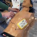 Übung mit dem Defibrilator