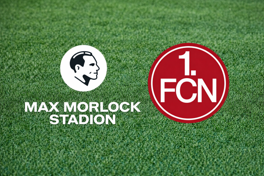 Logos Max-Morlock-Stadion und 1. FCN auf Rasen, Bild © Max-Morlock-Stadion