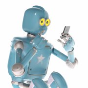 Ein Spielzeug-Vintage-Roboter schaut auf ein Smartphone