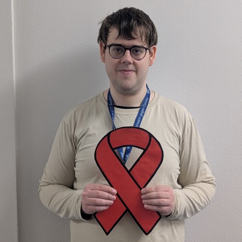 Online-Aktion, Welt-AIDS-Tag 2025, Florian, Verwaltungsmitarbeiterin, Gesundheitsamt
