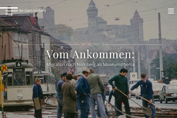 Gleisarbeiter um 1975, im Hintergrund die Burg und eine herannahende Straßenbahn.