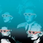 Mehrere Personen sitzen mit 3D-Brillen in einem Kinosaal