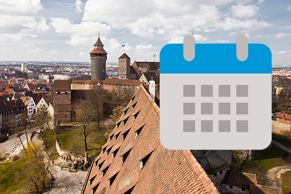 Blick über die Kaiserburg mit einem Kalendersymbol