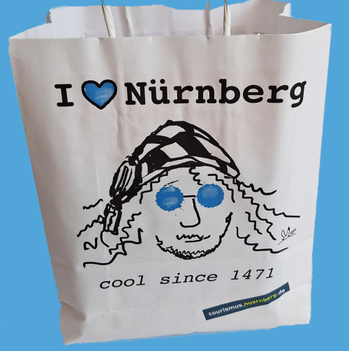 © ctz nuernberg Papiertüte mit einer Skizze von Albrecht Dürers Kopf und den Worten "I love Nürnberg" © ctz nuernberg