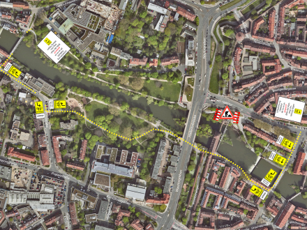 Foto von dem Bereich um die Haller·wiese von oben. Die Umleitungen für die Fahrrad·fahrer sind gelb eingezeichnet.