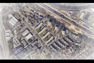 Bild Das Luftbild zeigt das Wohnquartier des Siedlungswerk. Der Wettbewerb Gensfelderweg befasste sich mit der Aufstockung des Wohnquartiers.