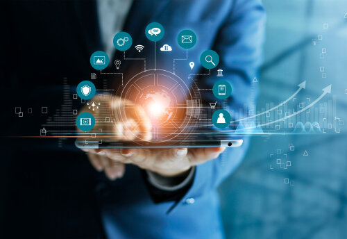 © AdobeStock Businessman using tablet analyzing sales data and economic growth graph chart, Technology and icon customer global network connection. Business strategy. Innovative. Digital marketing. © AdobeStock