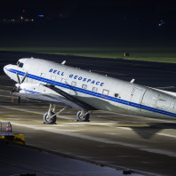 A Basler BT-67, former Douglas DC-3, propeller aircraft of research institute Bell Geospace parked at night on the apron in Graz, Austria