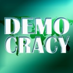 Vor einer grün eingefärbten Weltkarte steht mit großen Buchstaben Democracy.
