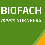 Bild mit Schriftzug "Biofach meets Nürnberg" in grün, orange und gelb