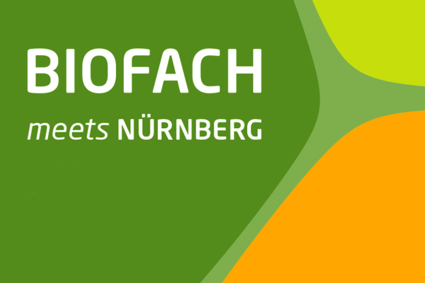 Bild mit Schriftzug "Biofach meets Nürnberg" in grün, orange und gelb