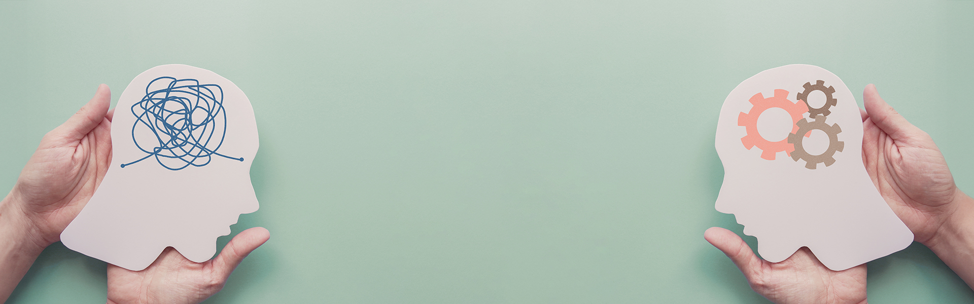 Hände halten Papier Köpfe