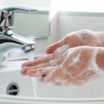 Washing hands.