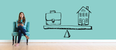 Work and life balance with young woman holding a tablet computer