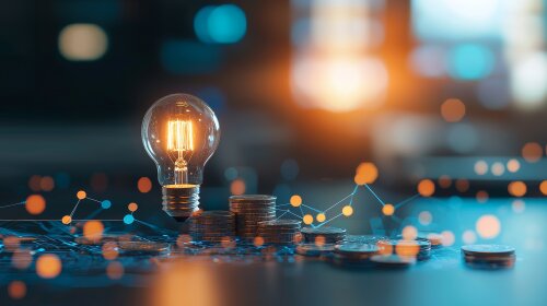 Glühbirne mit digitaler Vernetzung mit Geldmünzen