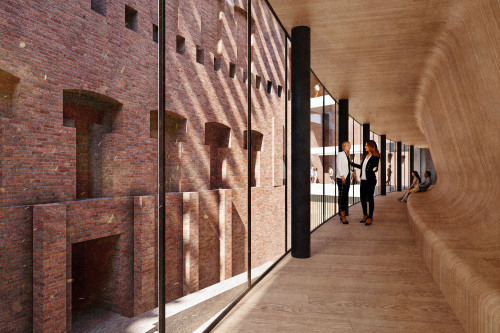 Verbindungsgang im rückwertigen Bereich des Ergänzungsbaus: Hier kann man auf kurzem Wege die Seiten des Saals wechseln mit Blick auf die Verbindungsstege sowie die Bestandsfassade.